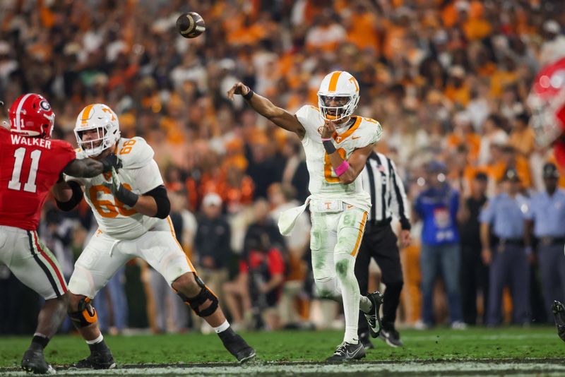 Nov 16, 2024; Athens, Georgia, USA; Tennessee Volunteers quarterback Nico Iamaleava (8) throws a pass against the Georgia Bulldogs in the second quarter at Sanford Stadium. Mandatory Credit: Brett Davis-Imagn Images