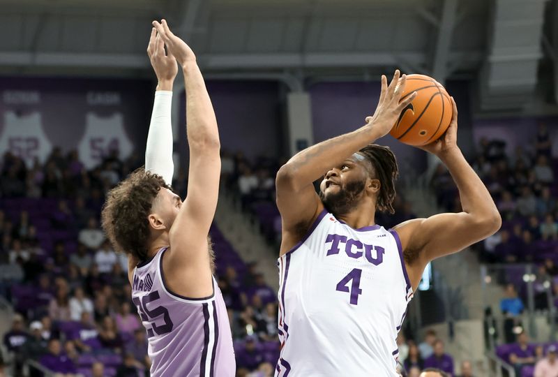 Jan 14, 2023; Fort Worth, Texas, USA;  TCU Horned Frogs center Eddie Lampkin Jr. (4) shoots over Kansas State Wildcats forward Ismael Massoud (25) during the first half at Ed and Rae Schollmaier Arena. Mandatory Credit: Kevin Jairaj-USA TODAY Sports