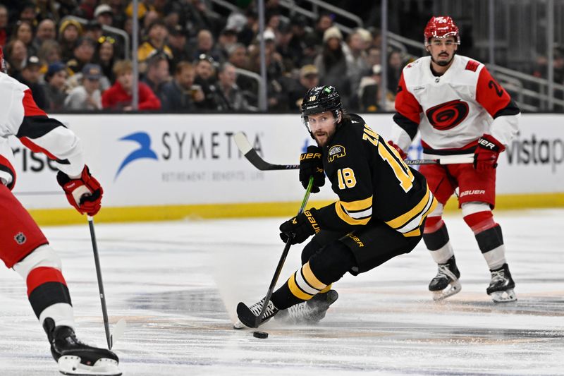 Nov 1, 2025; Boston, Massachusetts, USA; Boston Bruins center Pavel Zacha (18) plays the puck through the neutral zone during the first period against the Carolina Hurricanes at TD Garden. Mandatory Credit: Eric Canha-Imagn Images