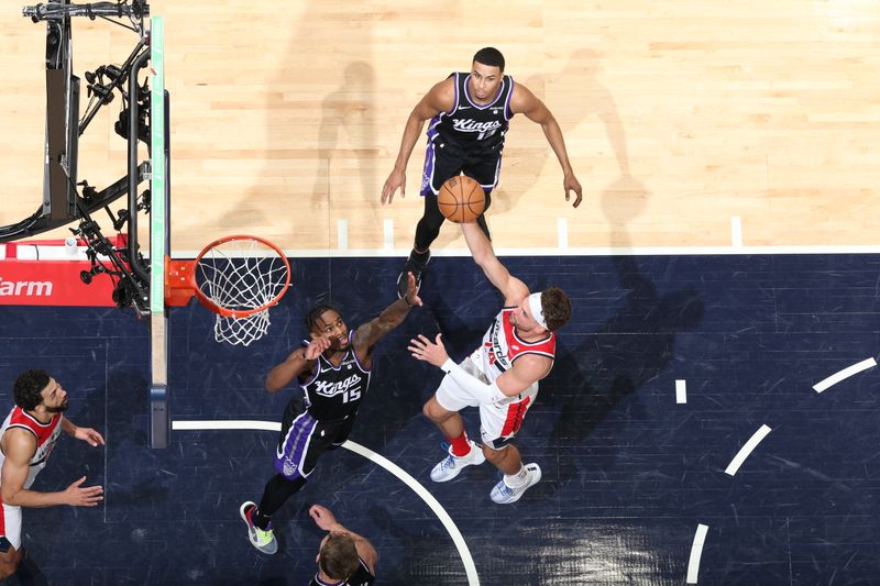 WASHINGTON, DC -? MARCH 21: Corey Kispert #24 of the Washington Wizards drives to the basket during the game against the Sacramento Kings on March 21, 2024 at Capital One Arena in Washington, DC. NOTE TO USER: User expressly acknowledges and agrees that, by downloading and or using this Photograph, user is consenting to the terms and conditions of the Getty Images License Agreement. Mandatory Copyright Notice: Copyright 2024 NBAE (Photo by Stephen Gosling/NBAE via Getty Images)