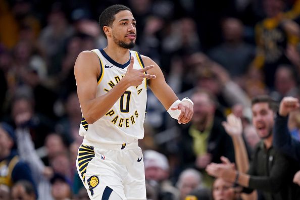 INDIANAPOLIS, INDIANA - NOVEMBER 22: Tyrese Haliburton #0 of the Indiana Pacers celebrates after making a shot in the fourth quarter against the Toronto Raptors at Gainbridge Fieldhouse on November 22, 2023 in Indianapolis, Indiana. NOTE TO USER: User expressly acknowledges and agrees that, by downloading and or using this photograph, User is consenting to the terms and conditions of the Getty Images License Agreement. (Photo by Dylan Buell/Getty Images)