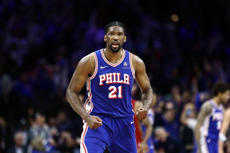 PHILADELPHIA, PENNSYLVANIA - APRIL 17: Joel Embiid #21 of the Philadelphia 76ers reacts during the fourth quarter against the Miami Heat during the Eastern Conference Play-In Tournament at the Wells Fargo Center on April 17, 2024 in Philadelphia, Pennsylvania. NOTE TO USER: User expressly acknowledges and agrees that, by downloading and or using this photograph, User is consenting to the terms and conditions of the Getty Images License Agreement. (Photo by Tim Nwachukwu/Getty Images)