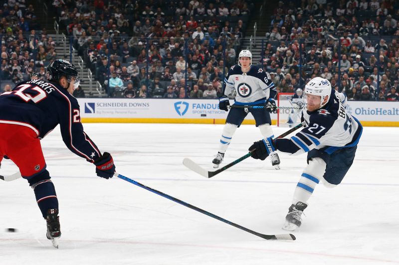 Nov 1, 2024; Columbus, Ohio, USA; Winnipeg Jets left wing Nikolaj Ehlers (27) scores a goal on a slap shot aColumbus Blue Jackets during the first period at Nationwide Arena. Mandatory Credit: Russell LaBounty-Imagn Images