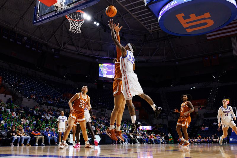 Jan 29, 2026; Gainesville, Florida, USA; Florida Gators guard Liv McGill (23) makes a layup against the Texas Longhorns during the second half at Exactech Arena at the Stephen C. O'Connell Center. Mandatory Credit: Matt Pendleton-Imagn Images