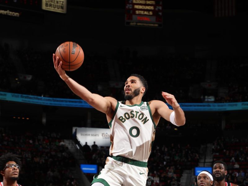 PORTLAND, OR - MARCH 11:  Jayson Tatum #0 of the Boston Celtics drives to the basket during the game against the Portland Trail Blazers on March 11, 2024 at the Moda Center Arena in Portland, Oregon. NOTE TO USER: User expressly acknowledges and agrees that, by downloading and or using this photograph, user is consenting to the terms and conditions of the Getty Images License Agreement. Mandatory Copyright Notice: Copyright 2024 NBAE (Photo by Cameron Browne/NBAE via Getty Images)