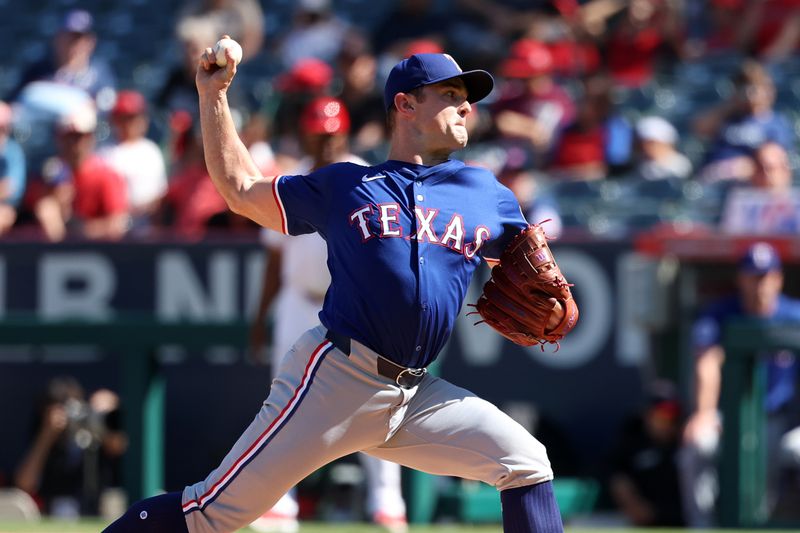 Sep 29, 2024; Anaheim, California, USA;  Texas Rangers relief pitcher David Robertson (37) pitches during the ninth inning against the Los Angeles Angels at Angel Stadium. Mandatory Credit: Kiyoshi Mio-Imagn Images