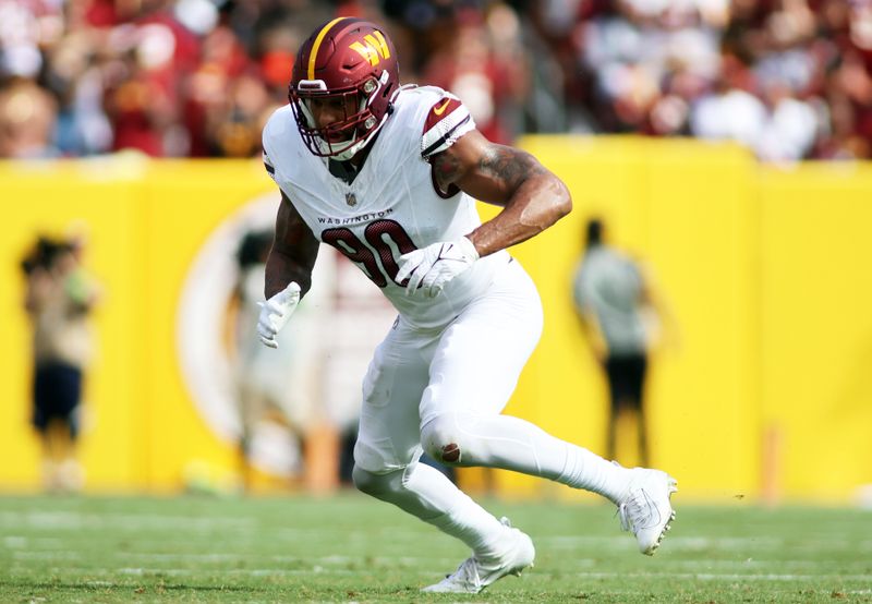 Washington Commanders defensive end Montez Sweat (90) runs during an NFL football game against the Arizona Cardinals, Sunday, September 10, 2023 in Landover, Maryland. (AP Photo/Daniel Kucin Jr.)