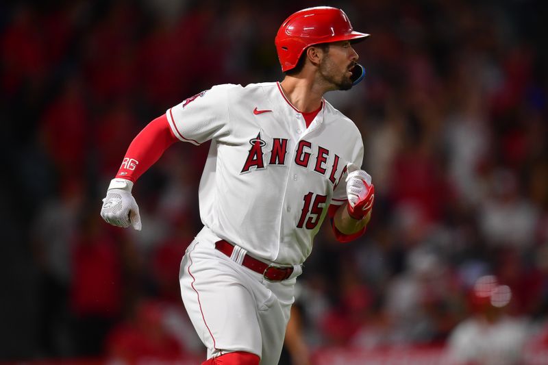 Sep 4, 2023; Anaheim, California, USA; Los Angeles Angels left fielder Randal Grichuk (15) runs after hitting a solo home run against the Baltimore Orioles during the fourth inning at Angel Stadium. Mandatory Credit: Gary A. Vasquez-USA TODAY Sports