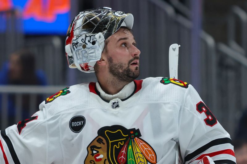 Apr 2, 2024; Elmont, New York, USA; Chicago Blackhawks goaltender Petr Mrazek (34) during a break in the action against the New York Islanders during the second period at UBS Arena. Mandatory Credit: Thomas Salus-USA TODAY Sports