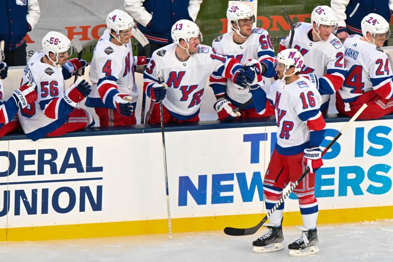 Feb 18, 2024; East Rutherford, New Jersey, USA;  New York Rangers center Vincent Trocheck (16) celebrates his goal against the New York Islanders  with the New York Rangers  bench during the second period in a Stadium Series ice hockey game at MetLife Stadium. Mandatory Credit: Dennis Schneidler-USA TODAY Sports