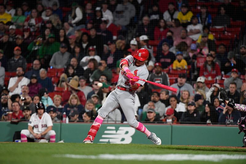 May 14, 2023; Boston, Massachusetts, USA; St. Louis Cardinals right fielder Lars Nootbaar (21) hits a double against the Boston Red Sox during the eighth inning at Fenway Park. Mandatory Credit: Eric Canha-USA TODAY Sports