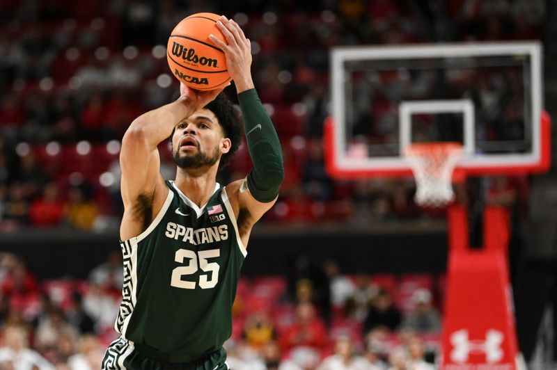 Jan 21, 2024; College Park, Maryland, USA;  Michigan State Spartans forward Malik Hall (25) takes a there point basket during the first half \GH\ at Xfinity Center. Mandatory Credit: Tommy Gilligan-USA TODAY Sports