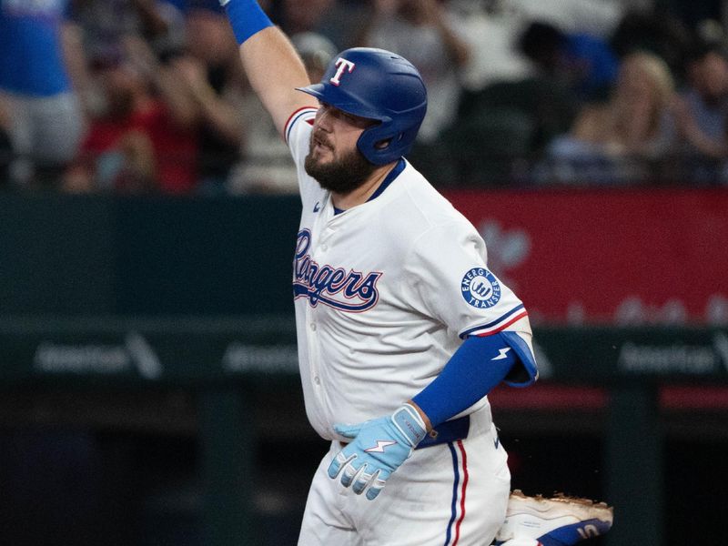 Sep 10, 2025; Arlington, Texas, USA; Texas Rangers first baseman Jake Burger (21) gestures as he rounds the bases on his two-run home run against the Milwaukee Brewers during the fifth inning at Globe Life Field. Mandatory Credit: Jim Cowsert-Imagn Images
