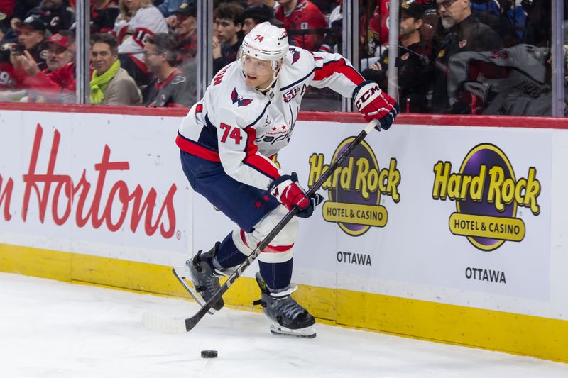 Jan 16, 2025; Ottawa, Ontario, CAN; Washington Capitals defenseman John Carlson (74) skates with the puck in the first period against the Ottawa Senators at the Canadian Tire Centre. Mandatory Credit: Marc DesRosiers-Imagn Images