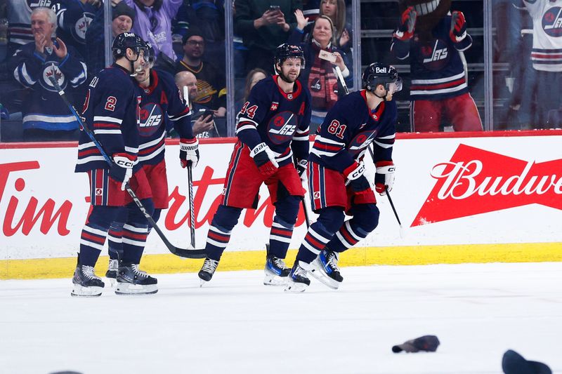 Jan 14, 2025; Winnipeg, Manitoba, CAN;  Winnipeg Jets forward Kyle Connor (81) celebrates his goal against the Vancouver Canucks during the first period at Canada Life Centre. Mandatory Credit: Terrence Lee-Imagn Images