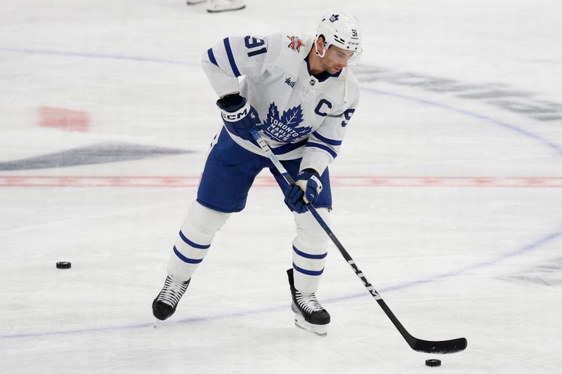 Oct 24, 2023; Washington, District of Columbia, USA; Toronto Maple Leafs center John Tavares (91) handles the puck during warmup prior to the game against the Washington Capitals at Capital One Arena. Mandatory Credit: Geoff Burke-USA TODAY Sports