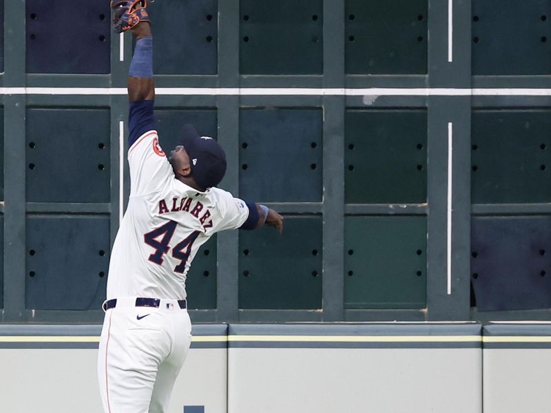 Aug 21, 2024; Houston, Texas, USA; Houston Astros left fielder Yordan Alvarez (44) cannot catch a double hit by Boston Red Sox shortstop Ceddanne Rafaela (43) in the second inning at Minute Maid Park. Mandatory Credit: Thomas Shea-USA TODAY Sports