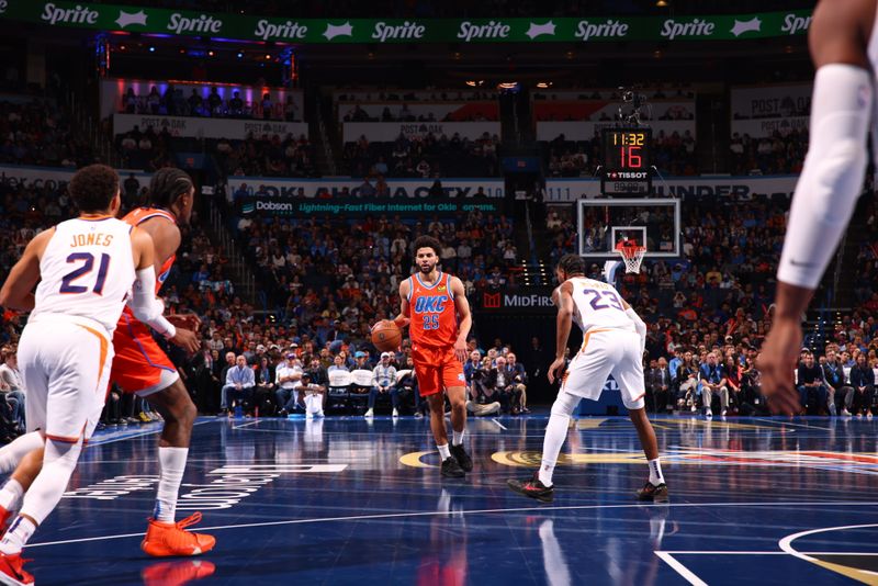 OKLAHOMA CITY, OK - NOVEMBER 15: Ajay Mitchell #25 of the Oklahoma City Thunder dribbles the ball during the game against the Phoenix Suns during the Emirates NBA Cup game on November 15, 2024 at Paycom Center in Oklahoma City, Oklahoma. NOTE TO USER: User expressly acknowledges and agrees that, by downloading and or using this photograph, User is consenting to the terms and conditions of the Getty Images License Agreement. Mandatory Copyright Notice: Copyright 2024 NBAE (Photo by Zach Beeker/NBAE via Getty Images)