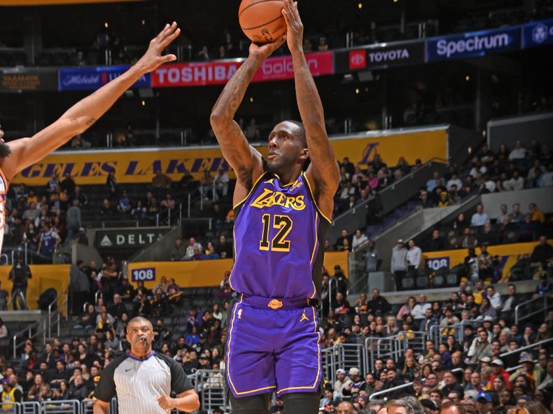 LOS ANGELES, CA - JANUARY 11: Taurean Prince #12 of the Los Angeles Lakers shoots the ball during the game against the Phoenix Suns on January 11, 2024 at Crypto.Com Arena in Los Angeles, California. NOTE TO USER: User expressly acknowledges and agrees that, by downloading and/or using this Photograph, user is consenting to the terms and conditions of the Getty Images License Agreement. Mandatory Copyright Notice: Copyright 2024 NBAE (Photo by Andrew D. Bernstein/NBAE via Getty Images)