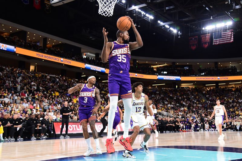 LOS ANGELES, CA - OCTOBER 6: Kevin Durant #35 of the Phoenix Suns goes up for the rebound during the game against the Los Angeles Lakers on October 6, 2024 at Acrisure Arena in Palm Springs, California. NOTE TO USER: User expressly acknowledges and agrees that, by downloading and/or using this Photograph, user is consenting to the terms and conditions of the Getty Images License Agreement. Mandatory Copyright Notice: Copyright 2024 NBAE (Photo by Adam Pantozzi/NBAE via Getty Images)