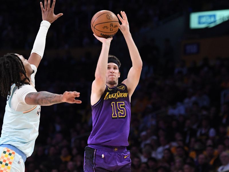 LOS ANGELES, CA - JANUARY 13: Austin Reaves #15 of the Los Angeles Lakers shoots the ball during the game against the San Antonio Spurs on January 13, 2025 at Crypto.Com Arena in Los Angeles, California. NOTE TO USER: User expressly acknowledges and agrees that, by downloading and/or using this Photograph, user is consenting to the terms and conditions of the Getty Images License Agreement. Mandatory Copyright Notice: Copyright 2025 NBAE (Photo by Noah Graham/NBAE via Getty Images)