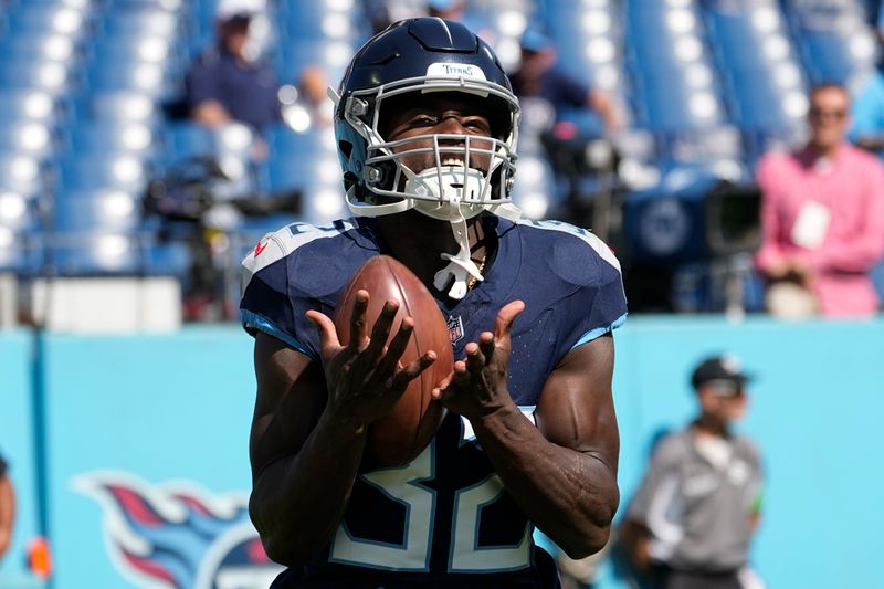 Tennessee Titans running back Tyjae Spears (32) warms up before an NFL football game between the Tennessee Titans and the Cincinnati Bengals, Sunday, Oct. 1, 2023, in Nashville, Tenn. (AP Photo/George Walker IV)