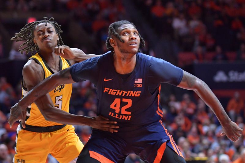 Nov 17, 2023; Champaign, Illinois, USA; Illinois Fighting Illini forward Dain Dainja (42) and Valparaiso Beacons forward Ola Ajiboye (5) battle for position under the basket during the second half at State Farm Center. Mandatory Credit: Ron Johnson-USA TODAY Sports