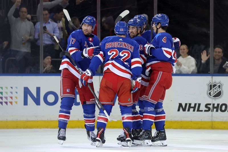 uJan 16, 2024; New York, New York, USA; New York Rangers right wing Blake Wheeler (17) celebrates his goal against the Seattle Kraken with teammates during the second period at Madison Square Garden. Mandatory Credit: Brad Penner-USA TODAY Sports