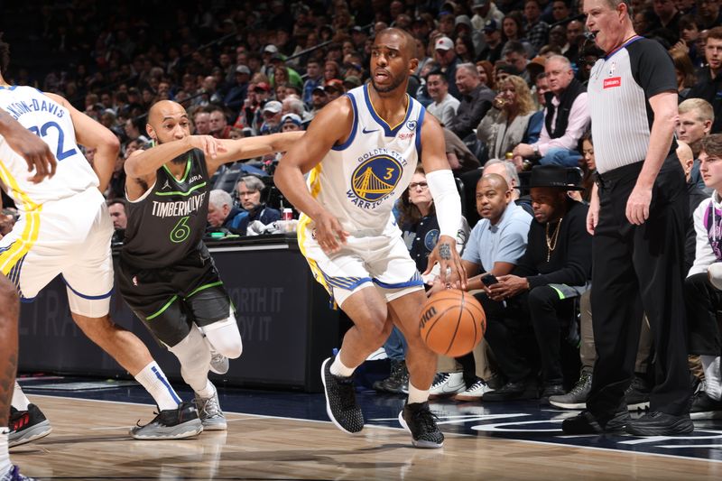 MINNEAPOLIS, MN -  MARCH 24: Chris Paul #3 of the Golden State Warriors handles the ball during the game against the Minnesota Timberwolves on March 24, 2024 at Target Center in Minneapolis, Minnesota. NOTE TO USER: User expressly acknowledges and agrees that, by downloading and or using this Photograph, user is consenting to the terms and conditions of the Getty Images License Agreement. Mandatory Copyright Notice: Copyright 2024 NBAE (Photo by David Sherman/NBAE via Getty Images)