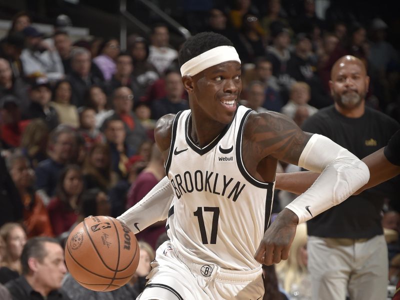 CLEVELAND, OH - MARCH 10: Dennis Schroder #17 of the Brooklyn Nets dribbles the ball during the game against the Cleveland Cavaliers on March 10, 2024 at Rocket Mortgage FieldHouse in Cleveland, Ohio. NOTE TO USER: User expressly acknowledges and agrees that, by downloading and/or using this Photograph, user is consenting to the terms and conditions of the Getty Images License Agreement. Mandatory Copyright Notice: Copyright 2024 NBAE (Photo by David Liam Kyle/NBAE via Getty Images)