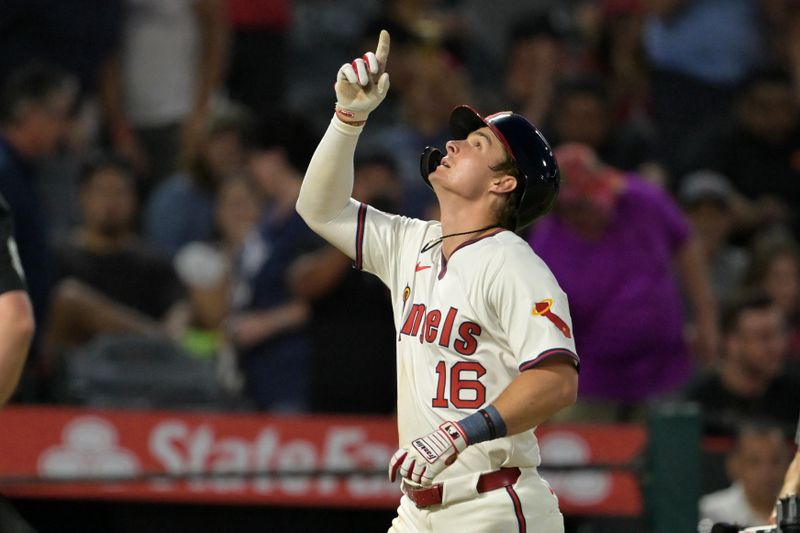 Aug 1, 2024; Anaheim, California, USA;  Los Angeles Angels center fielder Mickey Moniak (16) crosses the plate after hitting a solo home run in the sixth inning against the Colorado Rockies at Angel Stadium. Mandatory Credit: Jayne Kamin-Oncea-USA TODAY Sports