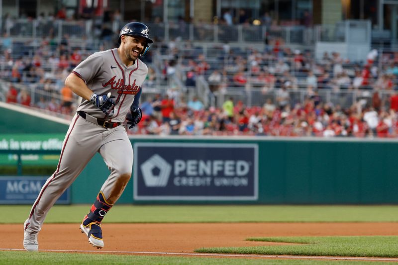 Jun 6, 2024; Washington, District of Columbia, USA; Atlanta Braves left fielder Adam Duvall (14) celebrates while rounding the bases after hitting a two run home run against the Washington Nationals during the seventh inning at Nationals Park. Mandatory Credit: Geoff Burke-USA TODAY Sports