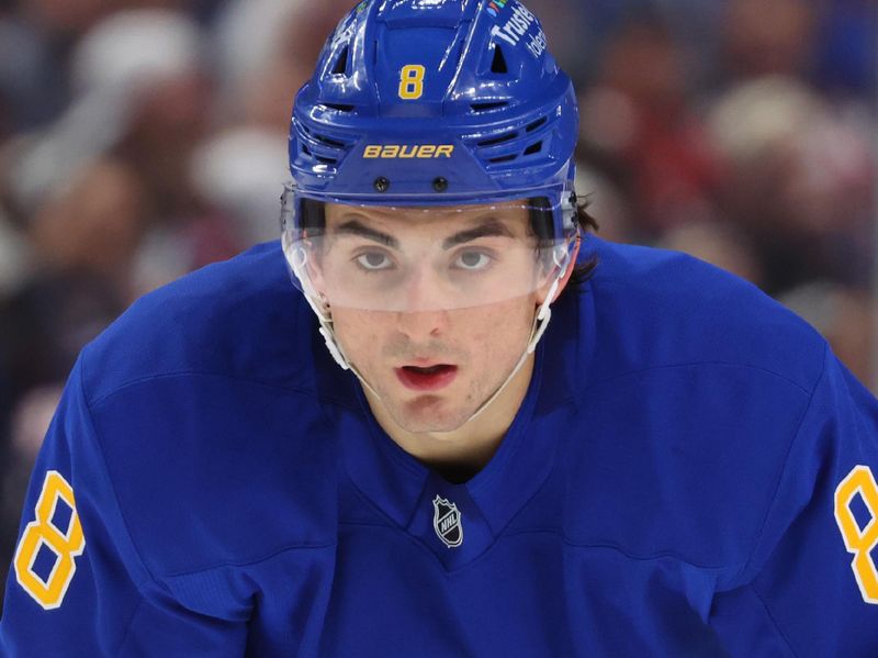 Oct 28, 2025; Buffalo, New York, USA;  Buffalo Sabres defenseman Michael Kesselring (8) waits for the face-off during the second period against the Columbus Blue Jackets at KeyBank Center. Mandatory Credit: Timothy T. Ludwig-Imagn Images