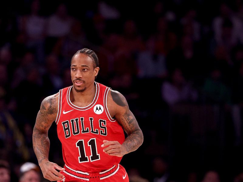 NEW YORK, NEW YORK - JANUARY 03: DeMar DeRozan #11 of the Chicago Bulls celebrates his three point shot during the first half against the New York Knicks at Madison Square Garden on January 03, 2024 in New York City. NOTE TO USER: User expressly acknowledges and agrees that, by downloading and or using this photograph, User is consenting to the terms and conditions of the Getty Images License Agreement. (Photo by Elsa/Getty Images)