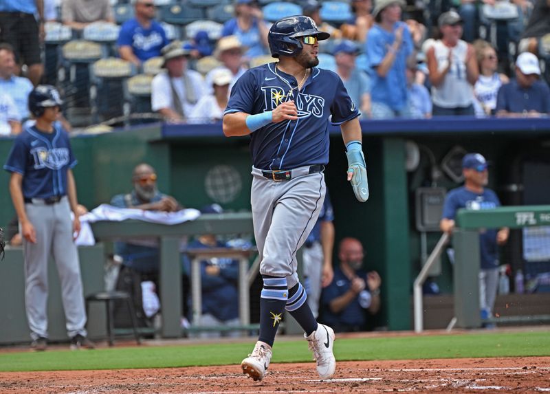 Jun 26, 2025; Kansas City, Missouri, USA;  Tampa Bay Rays first base Jonathan Aranda (62) scores a run in the fourth inning against the Kansas City Royals at Kauffman Stadium. Mandatory Credit: Peter Aiken-Imagn Images