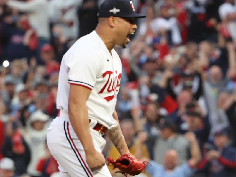 Oct 4, 2023; Minneapolis, Minnesota, USA; Minnesota Twins relief pitcher Jhoan Duran (59) delivers a pitch in the ninth inning against the Toronto Blue Jays during game two of the Wildcard series for the 2023 MLB playoffs at Target Field. Mandatory Credit: Jesse Johnson-USA TODAY Sports