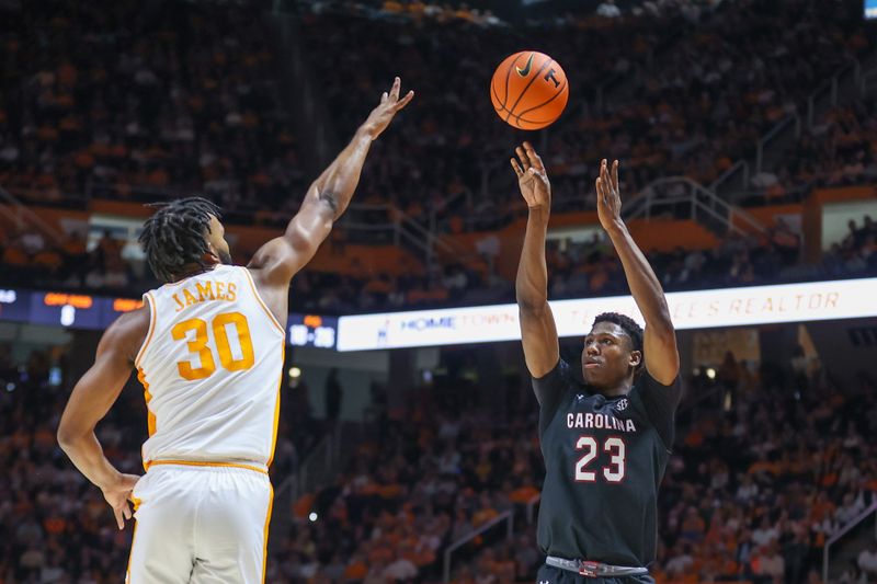 Feb 25, 2023; Knoxville, Tennessee, USA; South Carolina Gamecocks forward Gregory Jackson II (23) shoots the ball against Tennessee Volunteers guard Josiah-Jordan James (30) during the first half at Thompson-Boling Arena. Mandatory Credit: Randy Sartin-USA TODAY Sports