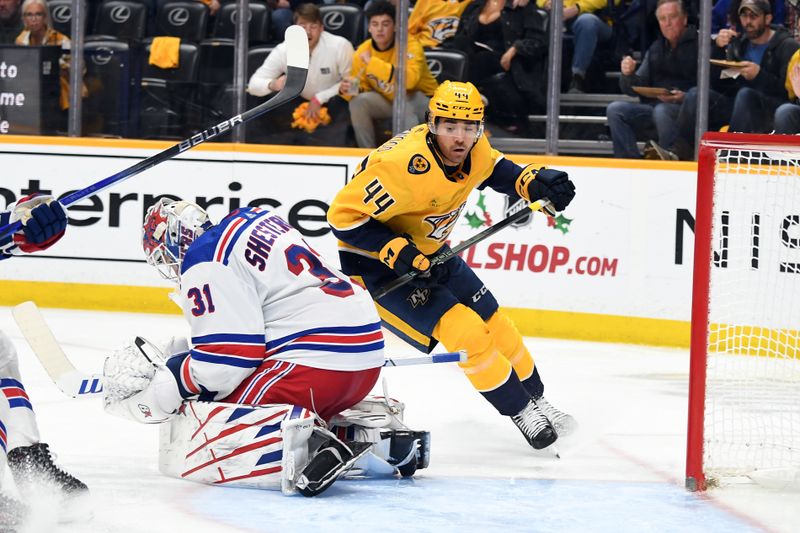 Dec 2, 2023; Nashville, Tennessee, USA; New York Rangers goaltender Igor Shesterkin (31) makes a save on a shot by Nashville Predators left wing Kiefer Sherwood (44) during the third period at Bridgestone Arena. Mandatory Credit: Christopher Hanewinckel-USA TODAY Sports