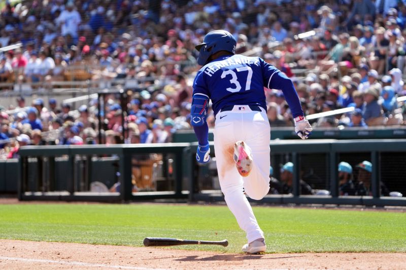 Mar 10, 2025; Phoenix, Arizona, USA; Los Angeles Dodgers outfielder Teoscar Hernández (37) runs the bases en route to a double against the Arizona Diamondbacks during the second inning at Camelback Ranch-Glendale. Mandatory Credit: Joe Camporeale-Imagn Images