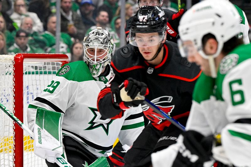 Jan 25, 2023; Dallas, Texas, USA; Dallas Stars goaltender Jake Oettinger (29) faces the Carolina Hurricanes attack during the third period at the American Airlines Center. Mandatory Credit: Jerome Miron-USA TODAY Sports