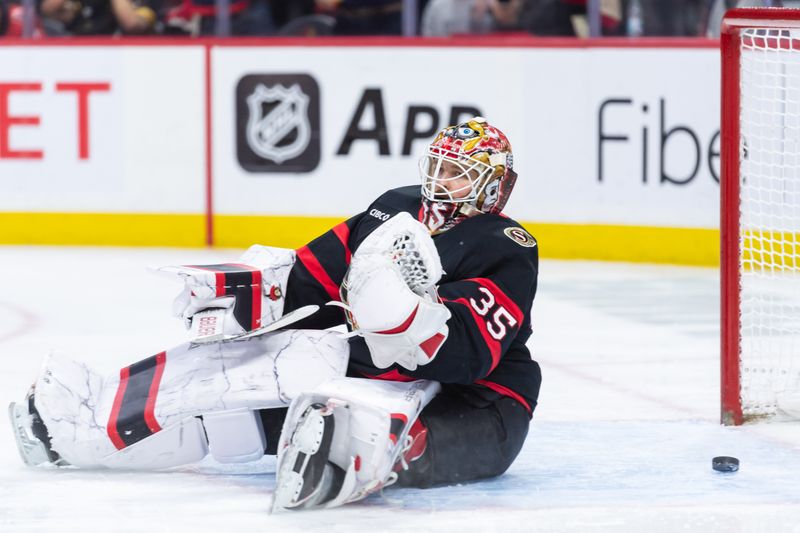 Apr 11, 2025; Ottawa, Ontario, CAN; Ottawa Senators goalie Linus Ullmark (35) is unable to stop a shot from Montreal Canadiens center Christian Dvorak (not pictured) in the second period at the Canadian Tire Centre. Mandatory Credit: Marc DesRosiers-Imagn Images