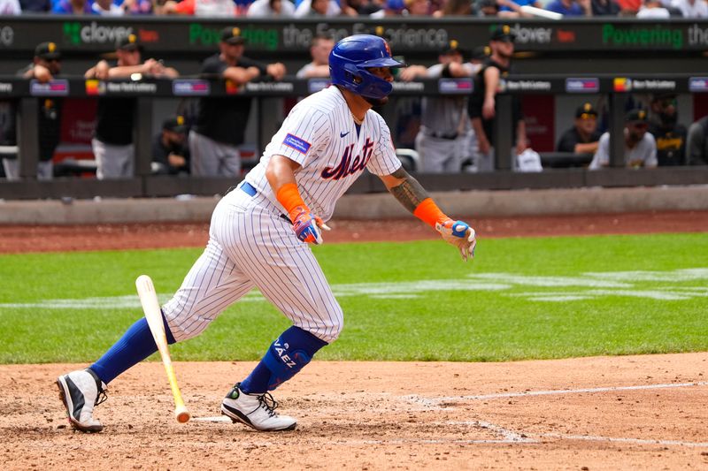 Aug 16, 2023; New York City, New York, USA; New York Mets catcher Omar Narvaez (2) hits a single against the Pittsburgh Pirates during the eighth inning at Citi Field. Mandatory Credit: Gregory Fisher-USA TODAY Sports