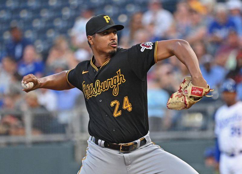 Aug 28, 2023; Kansas City, Missouri, USA;  Pittsburgh Pirates starting pitcher Johan Oviedo (24) delivers a pitch in the first inning against the Kansas City Royals at Kauffman Stadium. Mandatory Credit: Peter Aiken-USA TODAY Sports