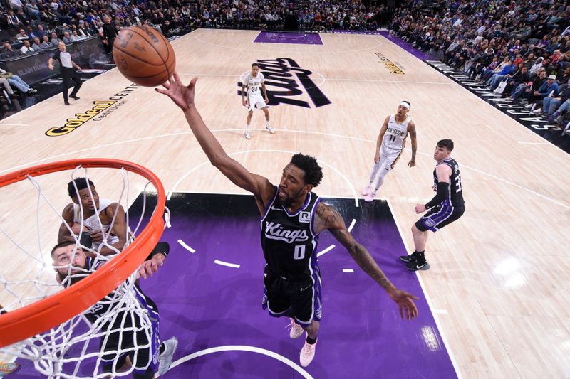 SACRAMENTO, CA - FEBRUARY 8:  Malik Monk #0 of the Sacramento Kings rebounds the ball during the game against the New Orleans Pelicans on February 8, 2025 at Golden 1 Center in Sacramento, California. NOTE TO USER: User expressly acknowledges and agrees that, by downloading and or using this Photograph, user is consenting to the terms and conditions of the Getty Images License Agreement. Mandatory Copyright Notice: Copyright 2025 NBAE (Photo by Rocky Widner/NBAE via Getty Images)