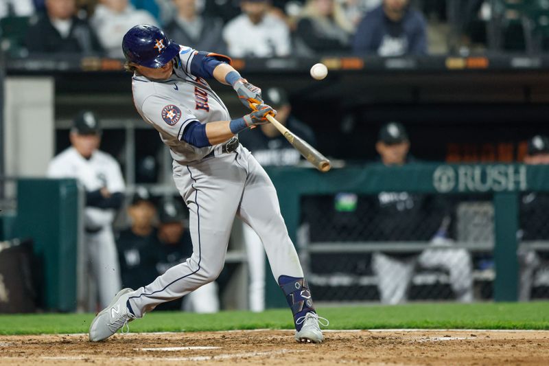 May 13, 2023; Chicago, Illinois, USA; Houston Astros center fielder Jake Meyers (6) singles against the Chicago White Sox during the seventh inning at Guaranteed Rate Field. Mandatory Credit: Kamil Krzaczynski-USA TODAY Sports