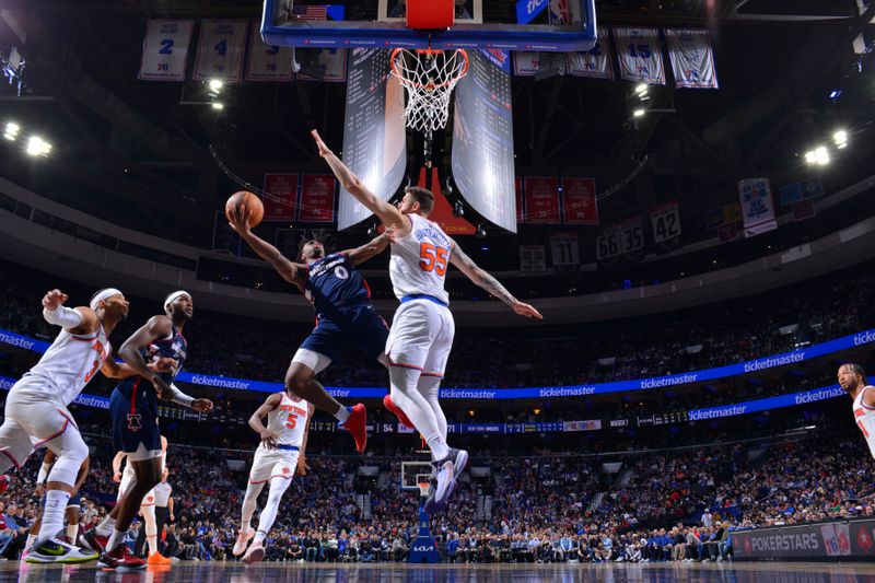 PHILADELPHIA, PA - FEBRUARY 22: Tyrese Maxey #0 of the Philadelphia 76ers drives to the basket during the game against the New York Knicks on February 22, 2024 at the Wells Fargo Center in Philadelphia, Pennsylvania NOTE TO USER: User expressly acknowledges and agrees that, by downloading and/or using this Photograph, user is consenting to the terms and conditions of the Getty Images License Agreement. Mandatory Copyright Notice: Copyright 2024 NBAE (Photo by Jesse D. Garrabrant/NBAE via Getty Images)