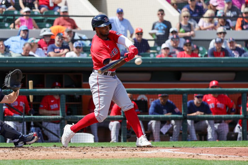 Mar 4, 2024; Lakeland, Florida, USA; Boston Red Sox shortstop Pablo Reyes (19) bats during the second inning against the Detroit Tigers at Publix Field at Joker Marchant Stadium. Mandatory Credit: Mike Watters-USA TODAY Sports