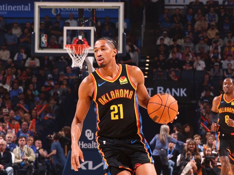 OKLAHOMA CITY, OK - NOVEMBER 17: Aaron Wiggins #21 of the Oklahoma City Thunder dribbles the ball during the game against the Dallas Mavericks on November 17, 2024 at Paycom Center in Oklahoma City, Oklahoma. NOTE TO USER: User expressly acknowledges and agrees that, by downloading and or using this photograph, User is consenting to the terms and conditions of the Getty Images License Agreement. Mandatory Copyright Notice: Copyright 2024 NBAE (Photo by Zach Beeker/NBAE via Getty Images)