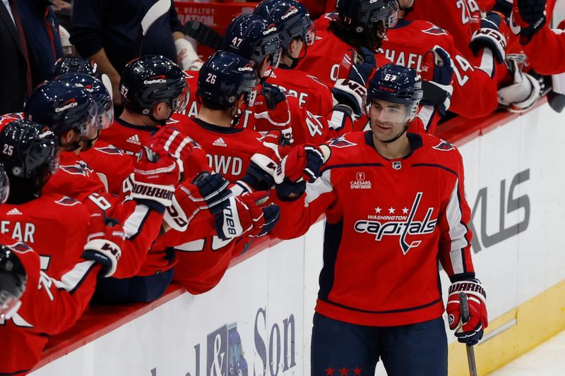 Jan 11, 2024; Washington, District of Columbia, USA; Washington Capitals left wing Max Pacioretty (67) celebrates with teammates after scoring a goal against the Seattle Kraken in the second period at Capital One Arena. Mandatory Credit: Geoff Burke-USA TODAY Sports