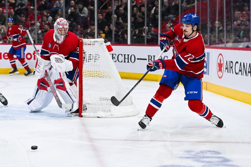 Mar 12, 2024; Montreal, Quebec, CAN; Montreal Canadiens defenseman Arber Xhekaj (72) shoots the puck away against the Columbus Blue Jackets during the second period at Bell Centre. Mandatory Credit: David Kirouac-USA TODAY Sports